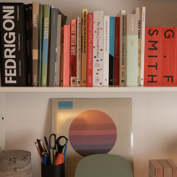 Photo of a bookshelf at ilka studio.