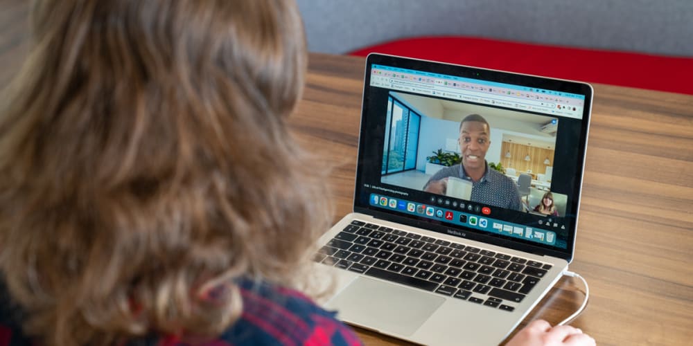 FreeAgent employee on a video call from another country