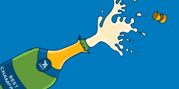 A bottle of champagne is popped open and laid out on a blue background.