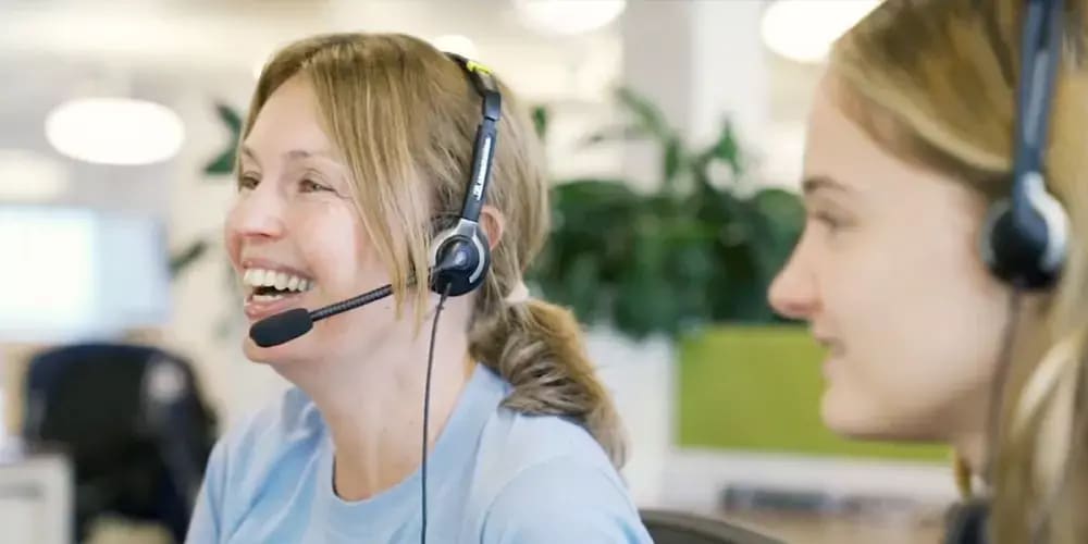 A photo of 2 of our great FreeAgent support staff answering calls